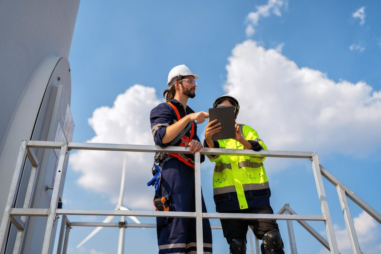 wind turbine service engineer stand on platform plan for maintenance electricity generator.jpg